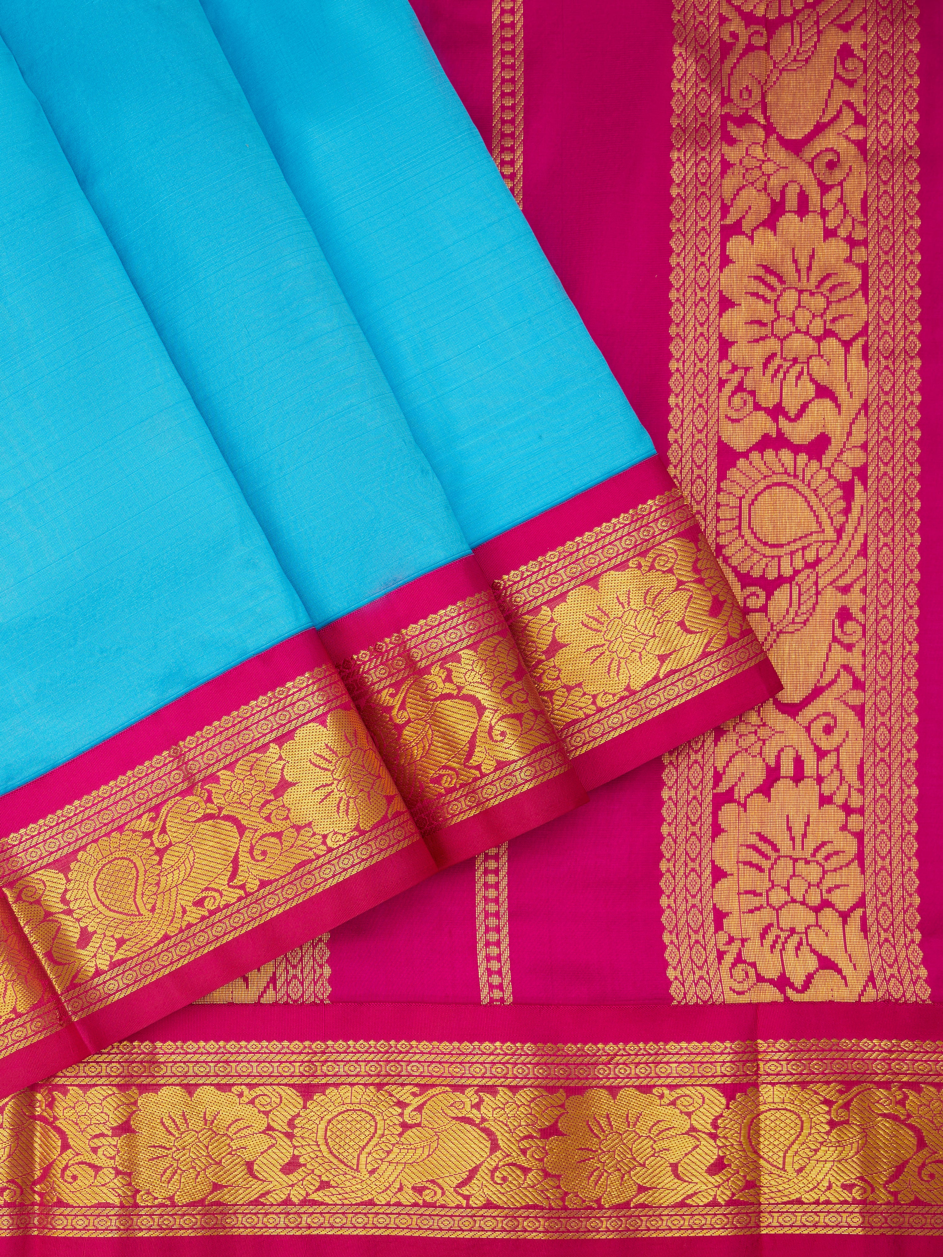 Madisar & Panchagacham - Silk Sarees Nine Yards' designs are known for  their intricate patterns and broader, thicker borders. These sarees are  crafted with utmost care and attention to detail, using the